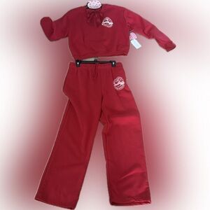 Women’s red size, large, sweatshirt, sweatpants, and hair bow all new with tags